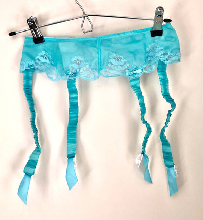 Bright blue Janet Reger lingerie set with skirt